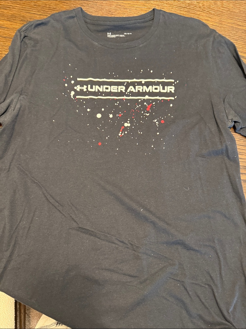 Under Armour Black Short-Sleeve Logo Tee with Red Accent Splatter
